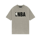 Fear of God Essentials NBA Warm Heather T-shirt | TheSneakerWay