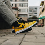 Jordan 1 Low University Gold (553558-700) | TheSneakerWay