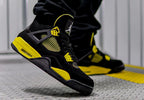 Jordan 4 Retro Thunder (2023) (GS) (408452-017) | TheSneakerWay